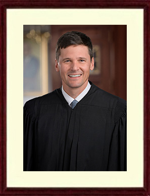 Photo of Justice Blake Hewitt